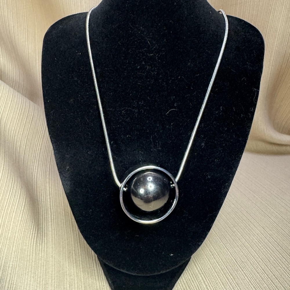 Silver Tone Modern Enclosed Ball Pendant Necklace - 33 Inches With a 4 Inch Ext.
